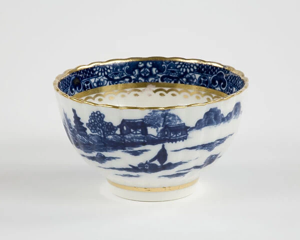 Tea bowl made from porcelain, transfer-printed in underglaze blue with