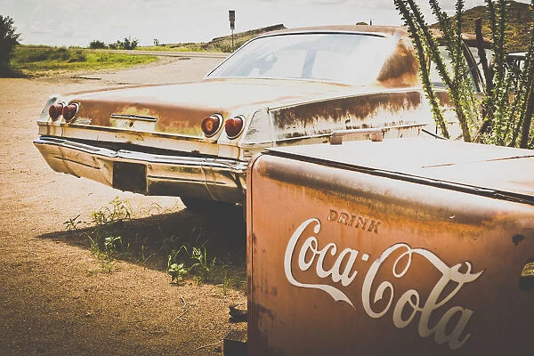 USA, Route 66, details of an old rugged Coca Cola fridge and car, vintage processing