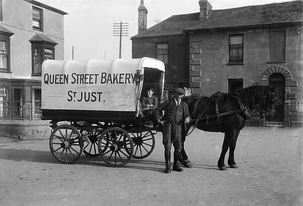 Horse drawn van of the Queen Street Bakery in Bank Square, St Just in Penwith, Cornwall. Early 1900s