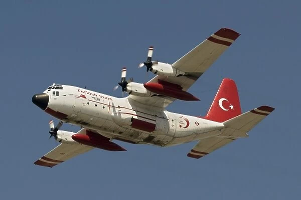 A Turkish Air Force C-130E Hercules wears the paint scheme of the Turkish Stars