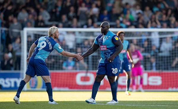 A Battle of Strength: Mackail-Smith and Akinfenwa's Showdown against Southend United, September 29, 2018