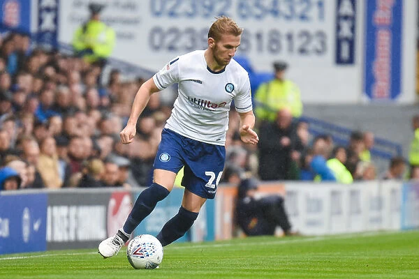 Jason McCarthy of Wycombe Wanderers in Intense Action Against Portsmouth, September 22, 2018