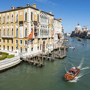 Venice, Veneto, Italy. Grand Canal and Santa Maria della Salute church from the Grand Canal