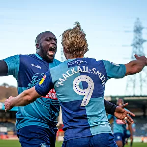 Determined Duel: Akinfenwa vs Mackail-Smith Clash Against Scunthorpe United, October 20, 2018