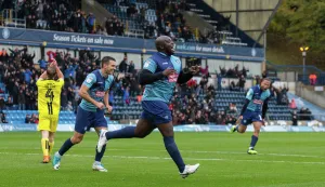 Adebayo Akinfenwa celebrates his 200th career goal
